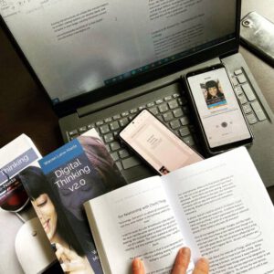 Print versus Digital versus Audio: a Writer's Personal Perspective image of books and digital devices