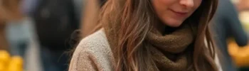 girl looking at her phone in a public market